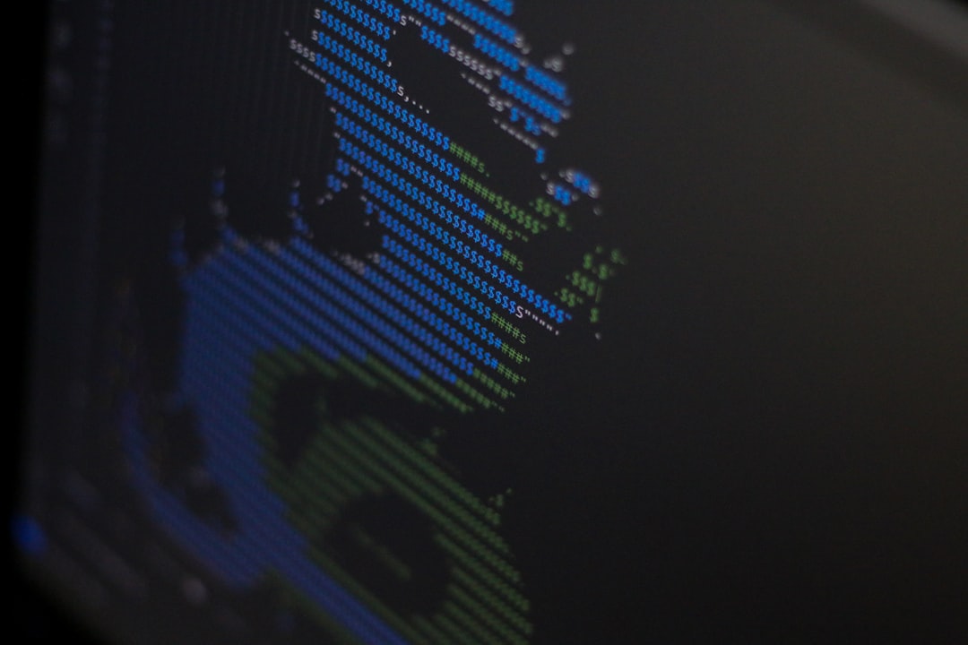 A close up of a computer screen with a blurry image of a person
