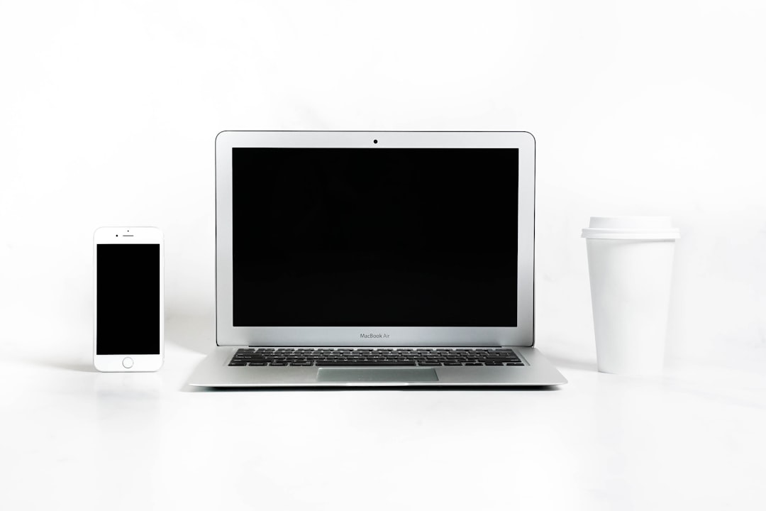a laptop and a coffee cup