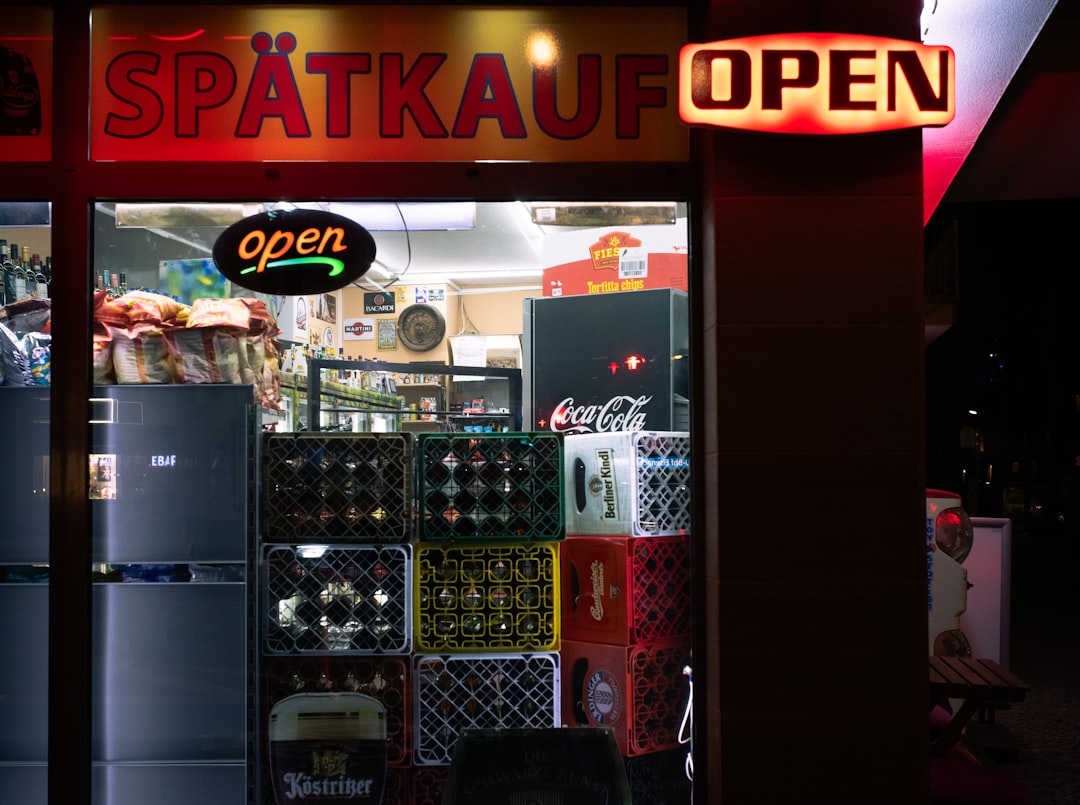 Spätkauf store entrance with open sign at night
