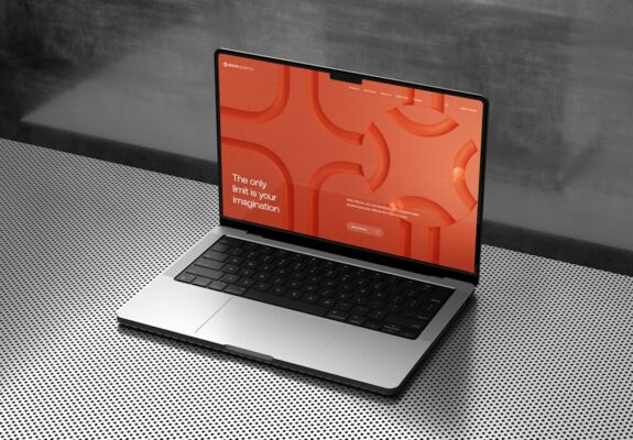 a laptop computer sitting on top of a table