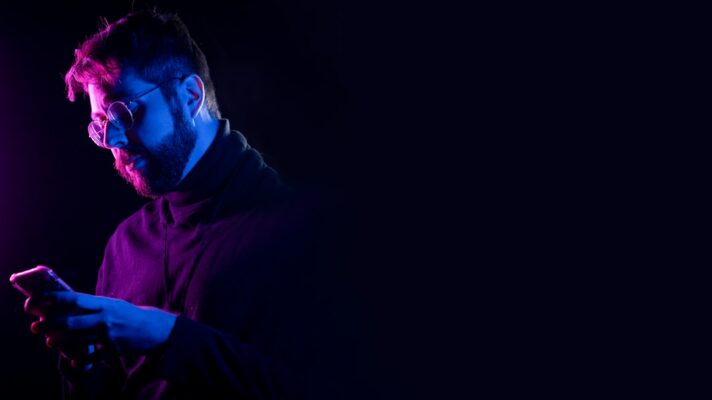man in purple hoodie jacket